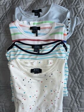 4 FDJ Women’s Tops. Sz Med and Large. Excellent condition.